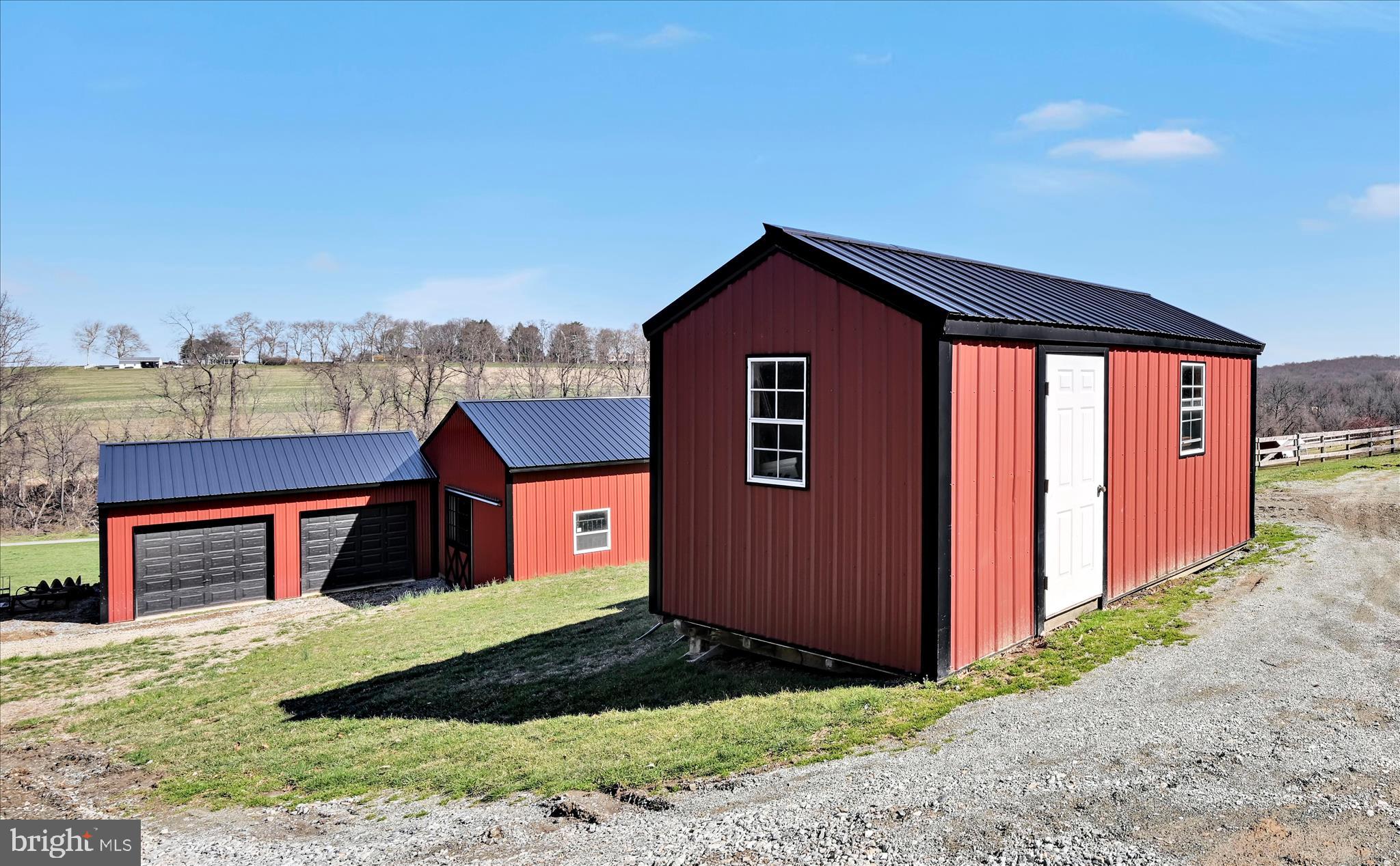 411 Red Hill Road Pequea, PA 17565 - Photo 50 of 50 a front view of a house with a yard