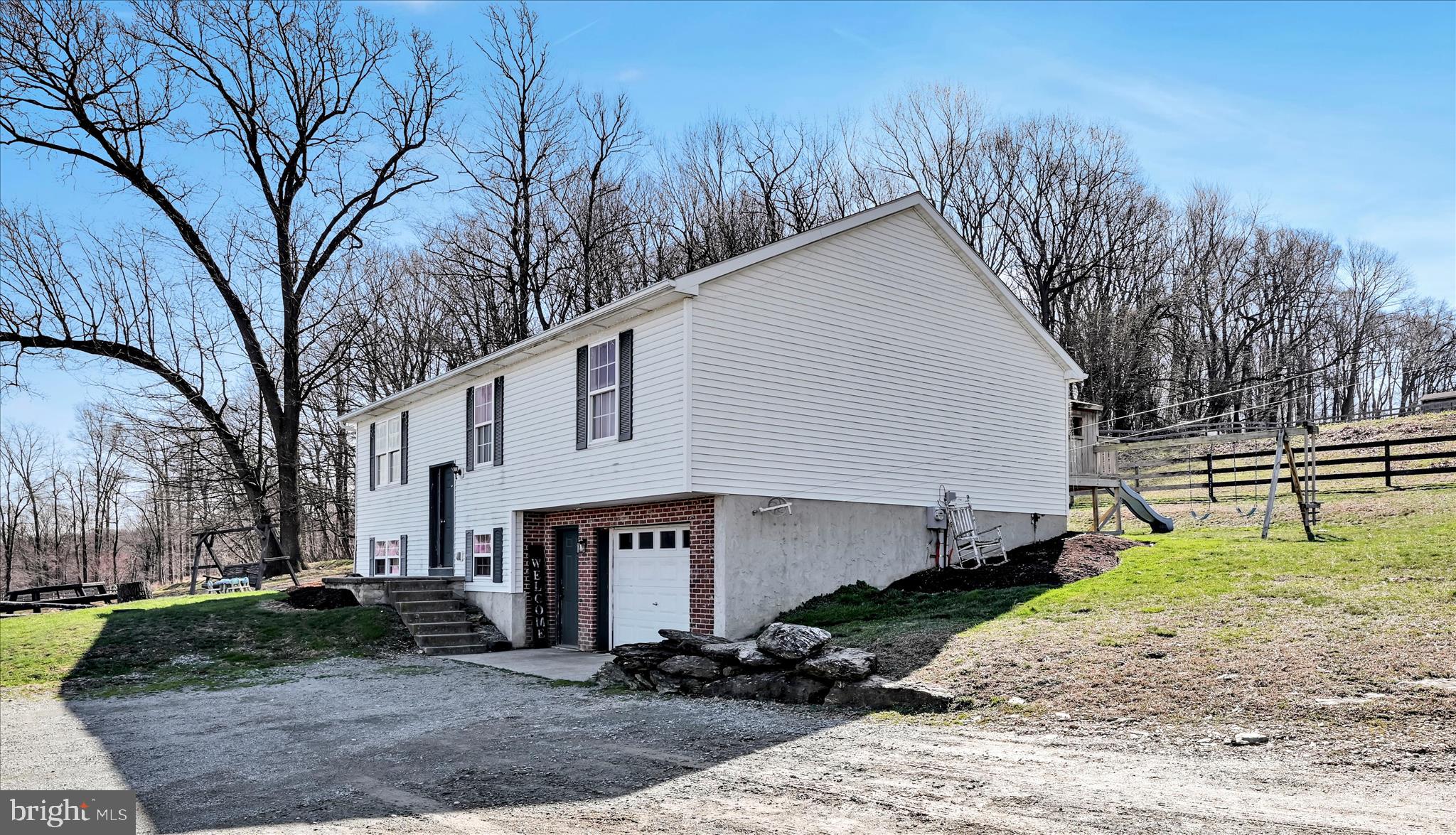 411 Red Hill Road Pequea, PA 17565 - Photo 10 of 50 a view of a house with a yard