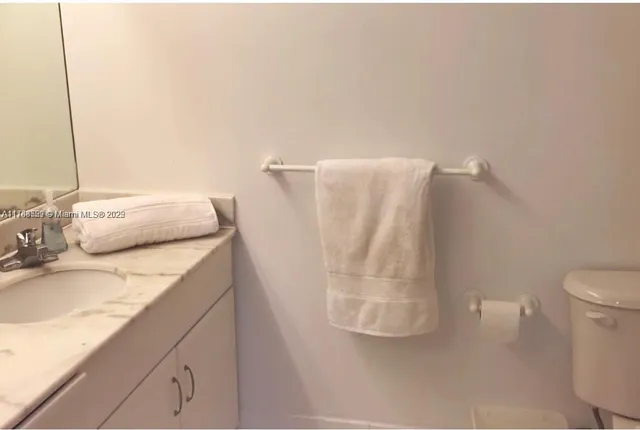 a bathroom with a sink and a vanity