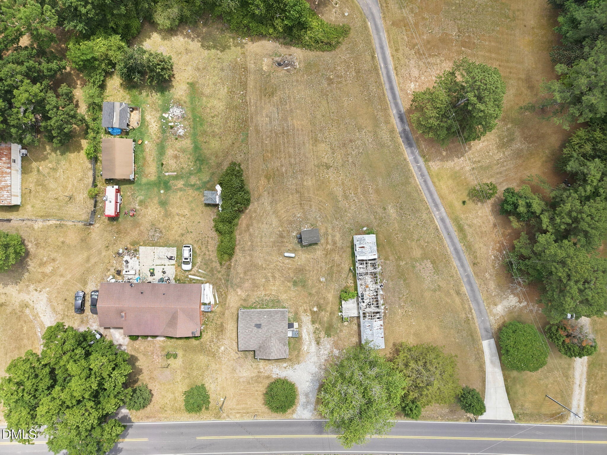 1758 Barber Mill Road Clayton, NC 27520 - Photo 33 of 41 an aerial view of residential houses with outdoor space