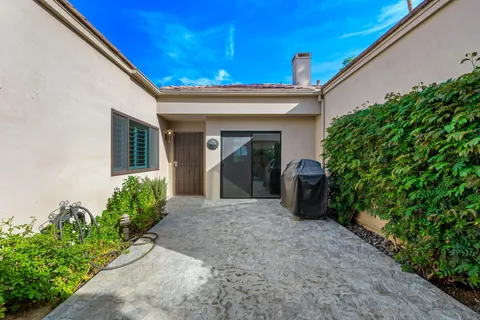 a view of a back yard of the house
