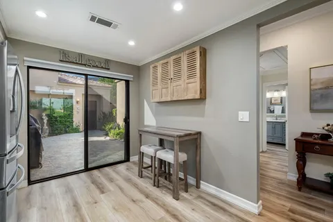 a view of a livingroom with furniture and front door