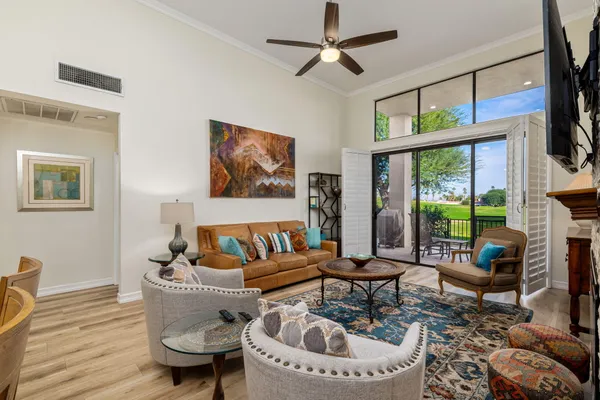 a living room with furniture and a window