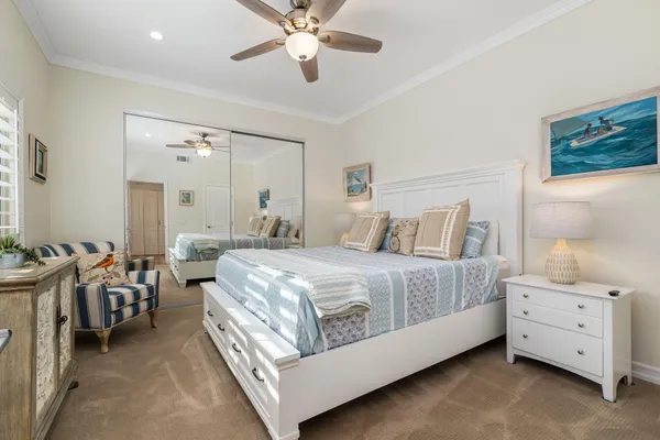 a bathroom with a granite countertop sink mirror and shower
