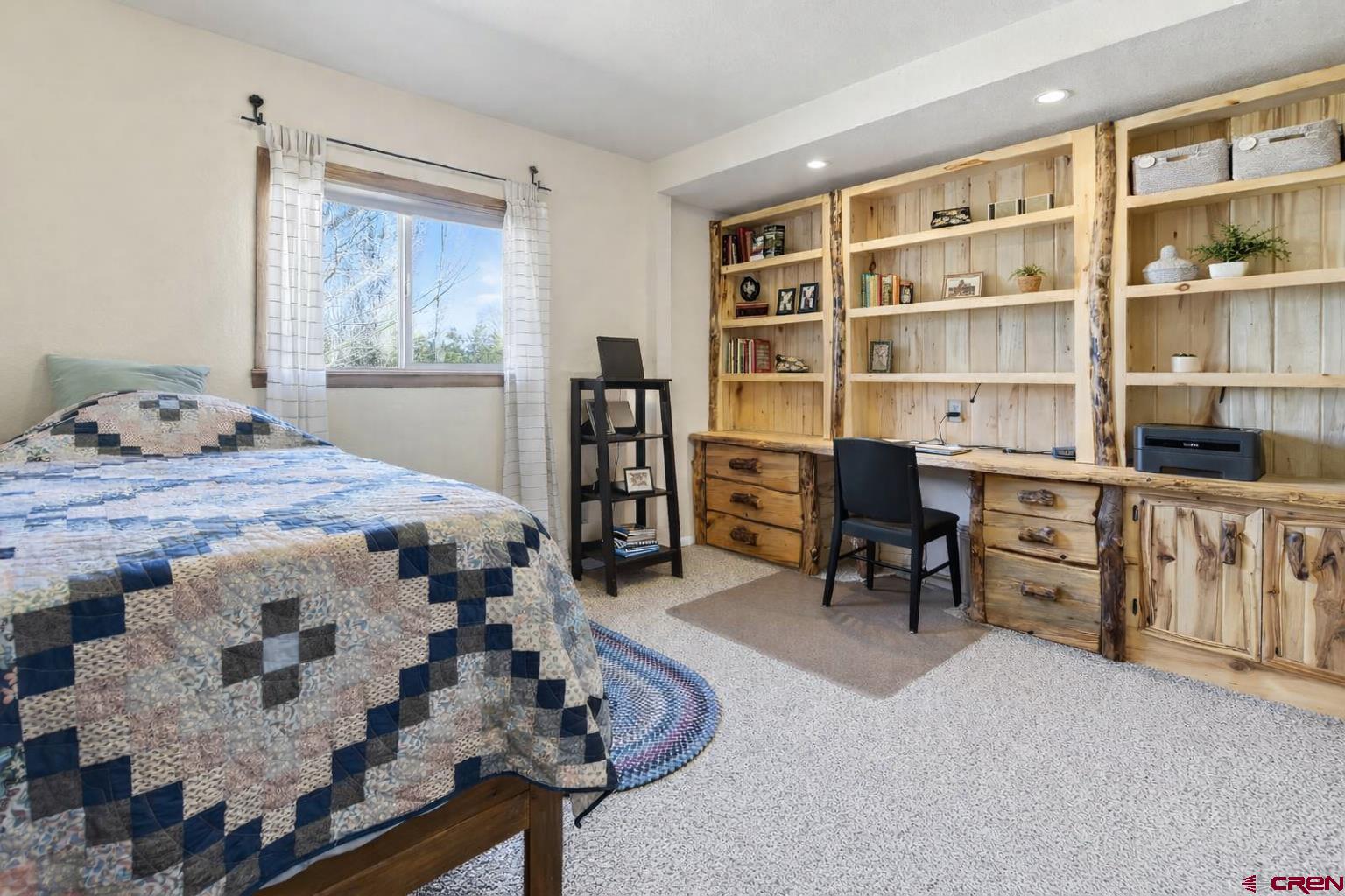 23360 Rd T Dolores, CO 81323 - Photo 18 of 45 a bedroom with a bed and closet