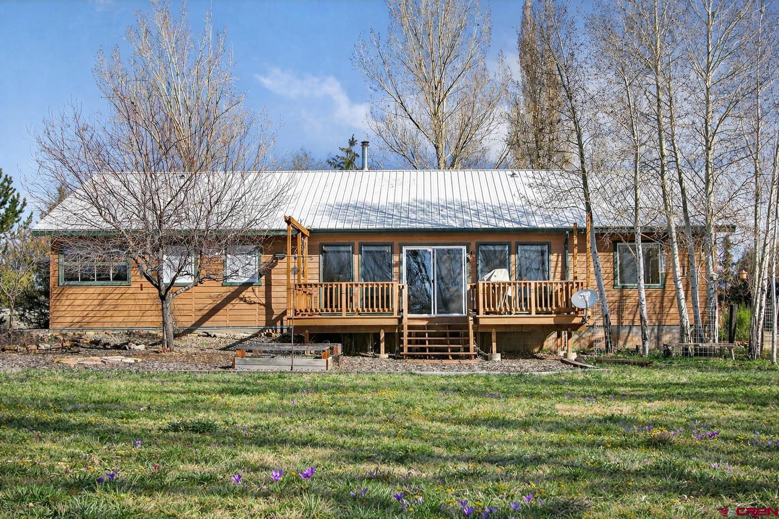 23360 Rd T Dolores, CO 81323 - Photo 43 of 45 a front view of house with a garden