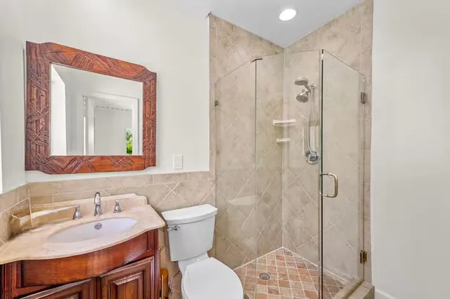 a view of a storage & utility room with washer and dryer