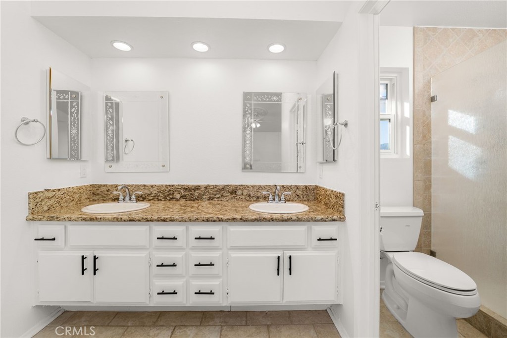 8985 Sage Drive Rancho Cucamonga, CA 91701 - Photo 19 of 49 Granite countertops - his and hers sinks and a ton of cabinet storage!