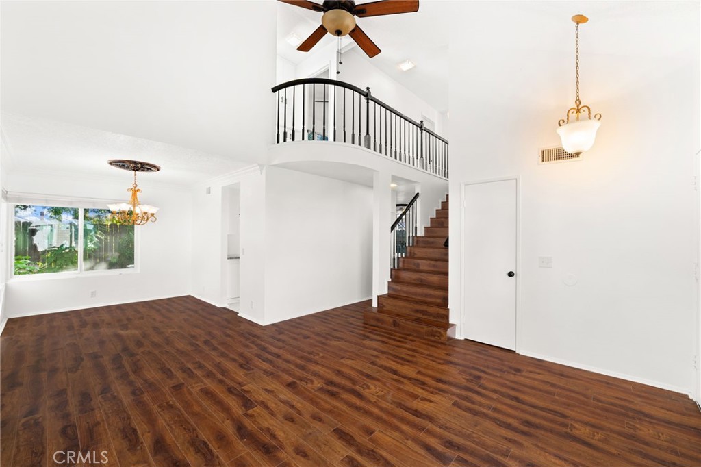 8985 Sage Drive Rancho Cucamonga, CA 91701 - Photo 2 of 49 We love the soaring high ceilings as you enter the home, and the catwalk overlook adds such an elegant touch.