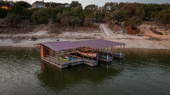 17743 West Reed Park Road Jonestown, TX 78645 - Photo 18 of 18 a view of a lake with roof