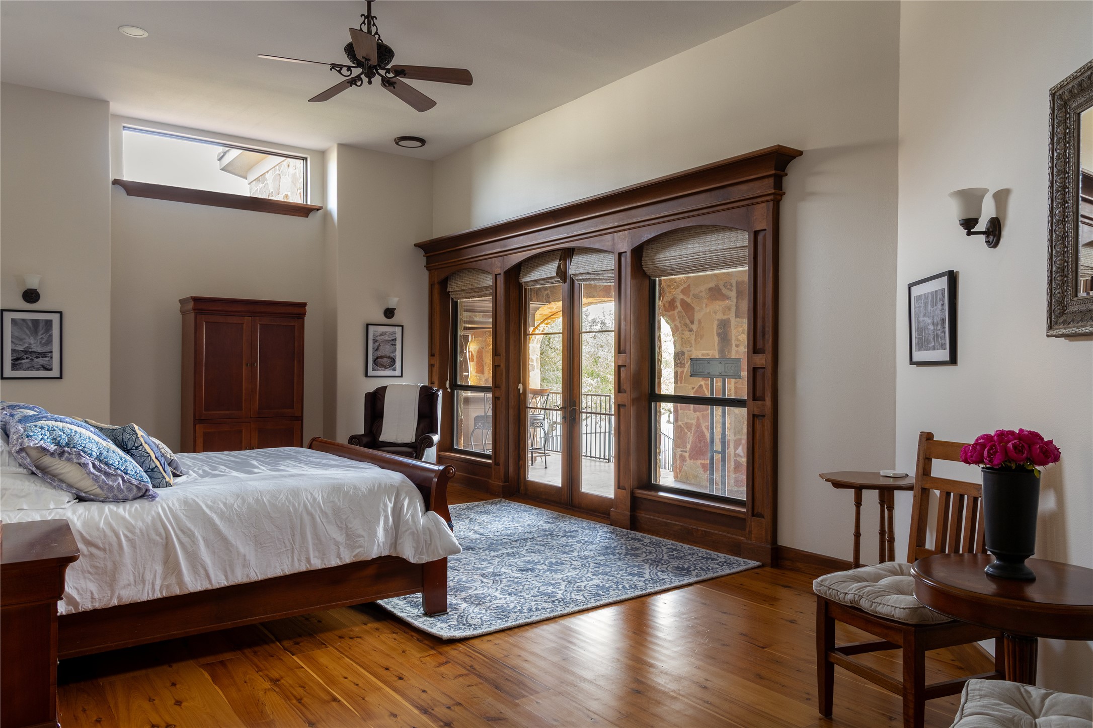 17743 West Reed Park Road Jonestown, TX 78645 - Photo 6 of 18 a bedroom with a bed and wooden floor