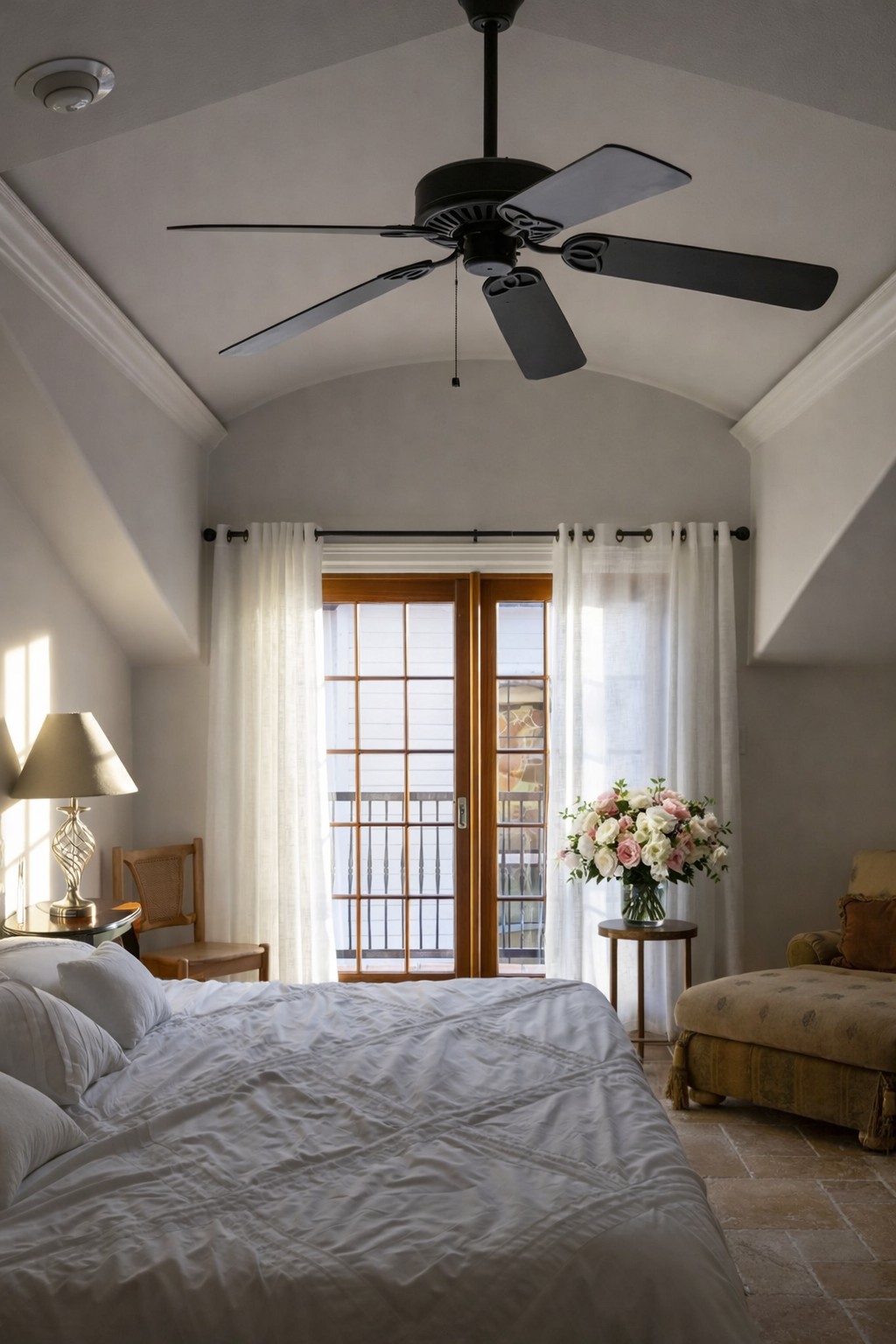 17743 West Reed Park Road Jonestown, TX 78645 - Photo 9 of 18 a bedroom with furniture and a chandelier