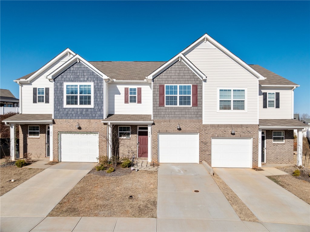 452 Bee Cv Way Pendleton, SC 29670 - Photo 1 of 37 This townhome features a clean exterior, welcoming residents with its appealing facade.