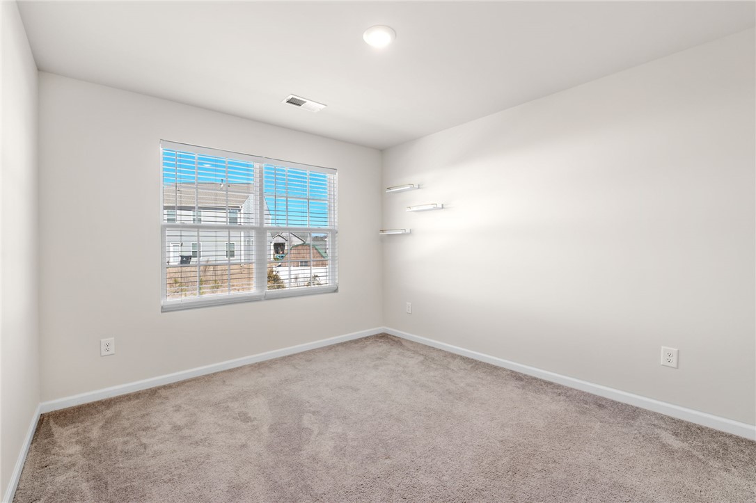 452 Bee Cv Way Pendleton, SC 29670 - Photo 18 of 37 This bright and airy room offers a versatile space for living or working.