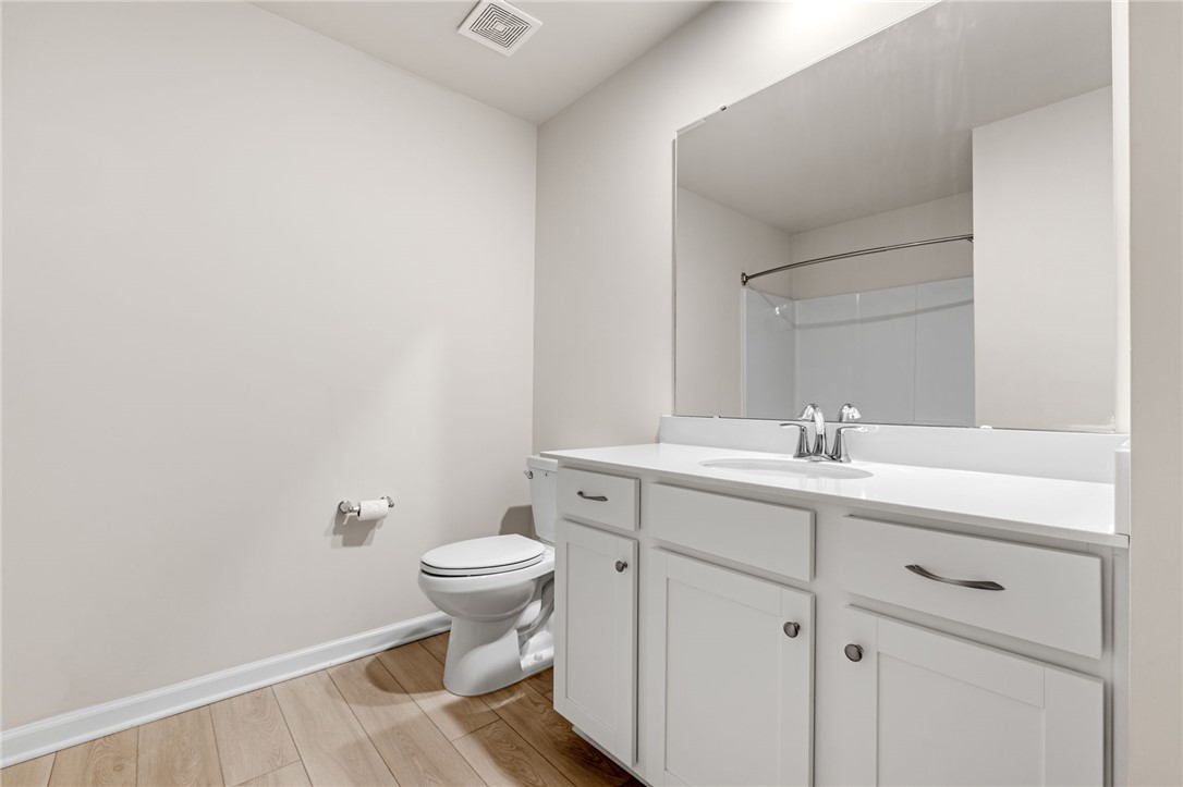 452 Bee Cv Way Pendleton, SC 29670 - Photo 19 of 37 This bright bathroom features a spacious vanity with ample storage and sleek fixtures.