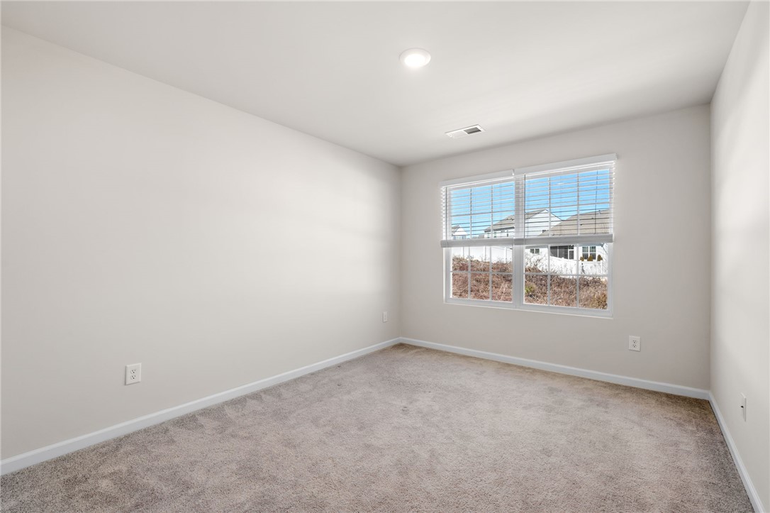 452 Bee Cv Way Pendleton, SC 29670 - Photo 20 of 37 This bright and airy room offers a versatile space, ideal for various living arrangements.