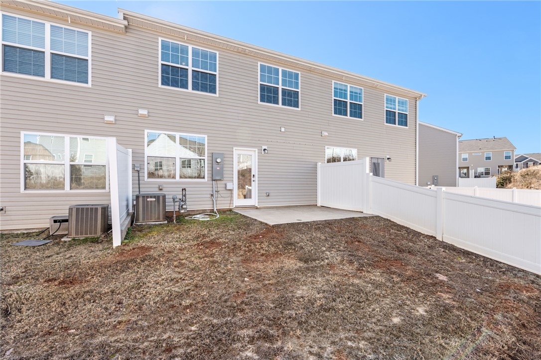 452 Bee Cv Way Pendleton, SC 29670 - Photo 28 of 37 This townhome offers an exterior patio area with ample space for outdoor living.