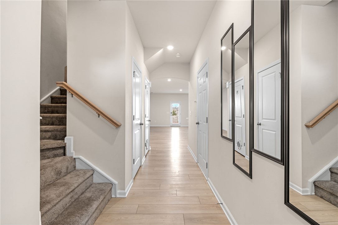 452 Bee Cv Way Pendleton, SC 29670 - Photo 4 of 37 This spacious entry hall features a staircase and durable flooring leading to an inviting bright space.