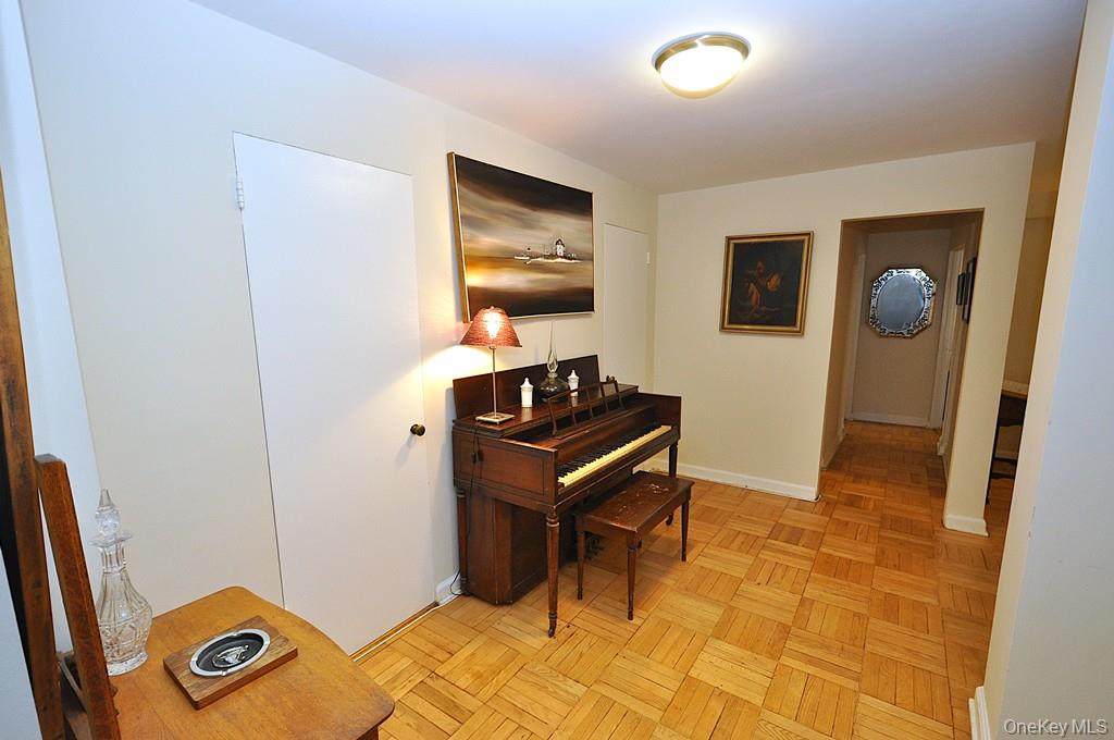 235 Garth Road, Unit A5B Scarsdale, NY 10583 - Photo 29 of 47 a view of a workspace with furniture and a window