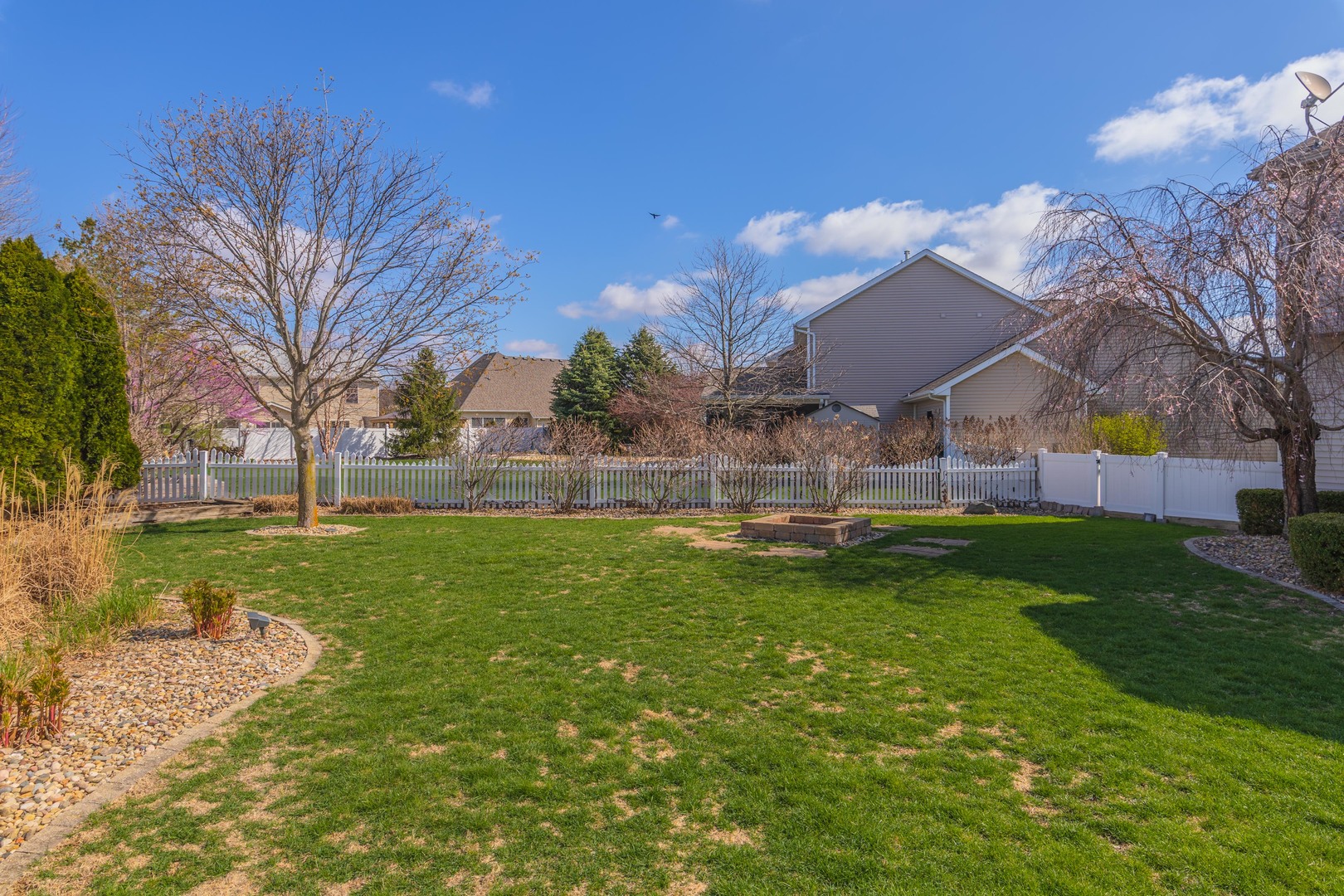 1223 Joy Walk Way Normal, IL 61761 - Photo 43 of 48 a backyard of a house with table and chairs