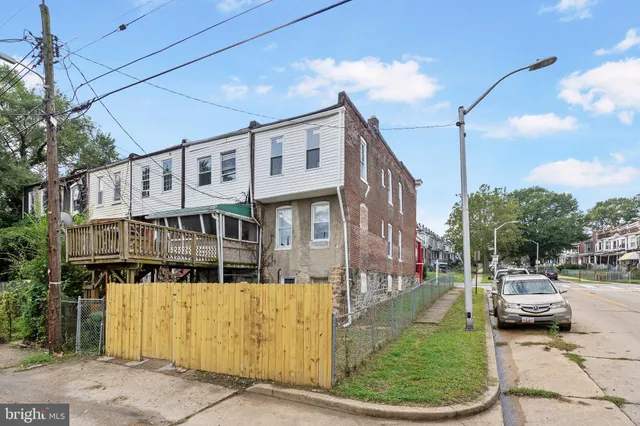 a front view of a building with garden