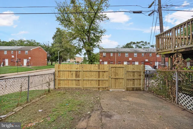 a view of a street with a building in the background