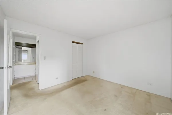 an empty room with closet