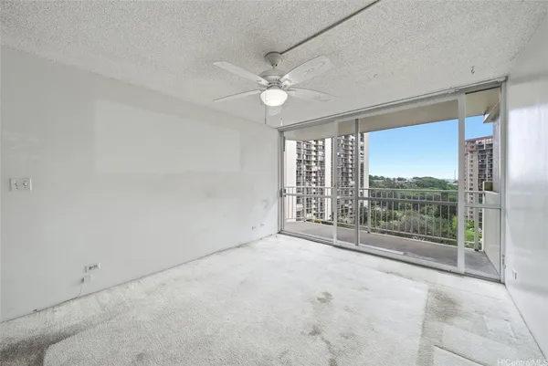 a view of a room with balcony and outdoor space