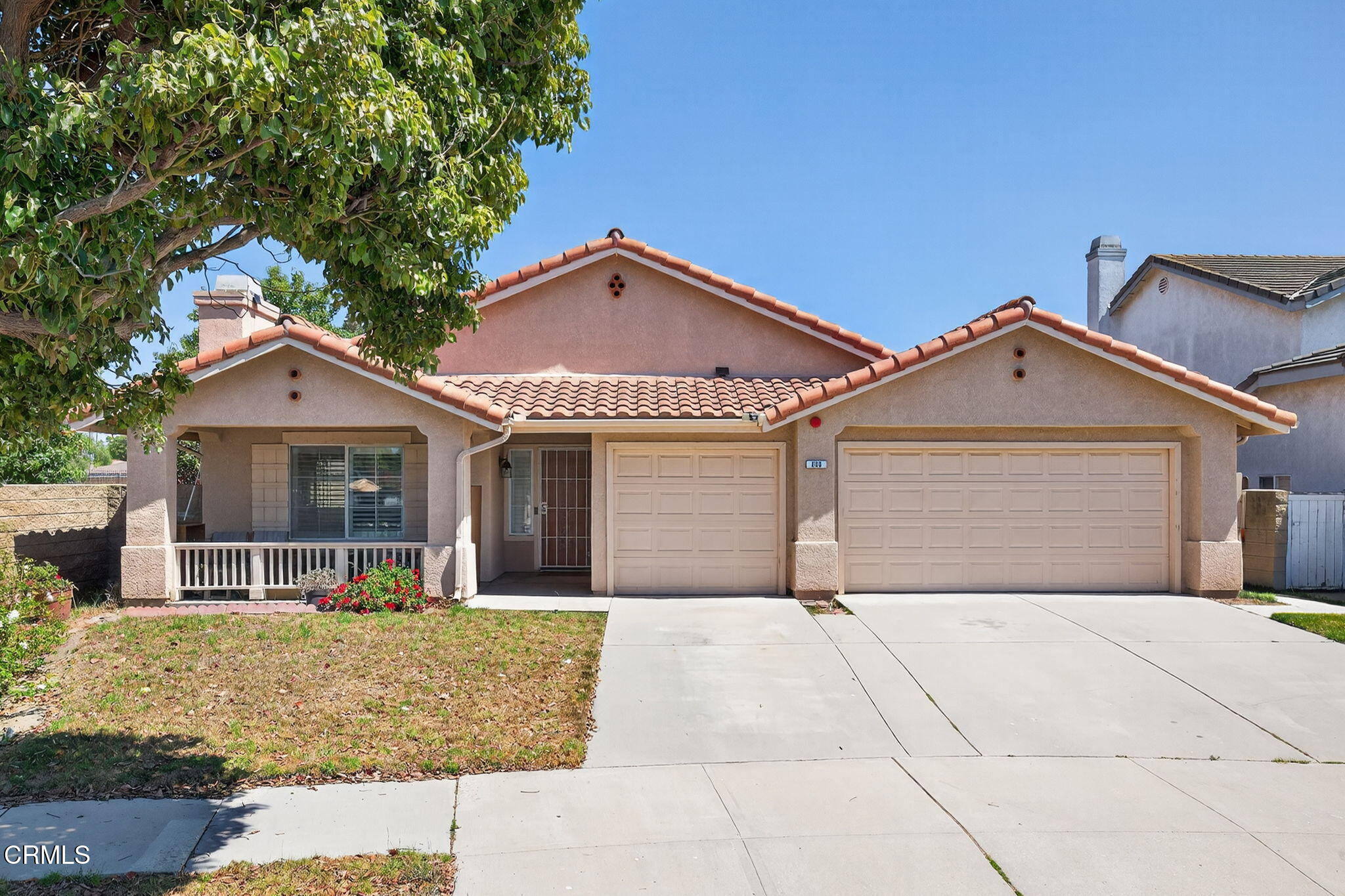 front view of a house and a yard