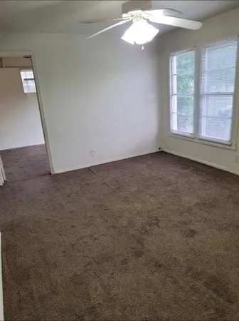 a view of a livingroom with a window