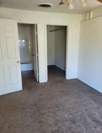 an empty room with closet