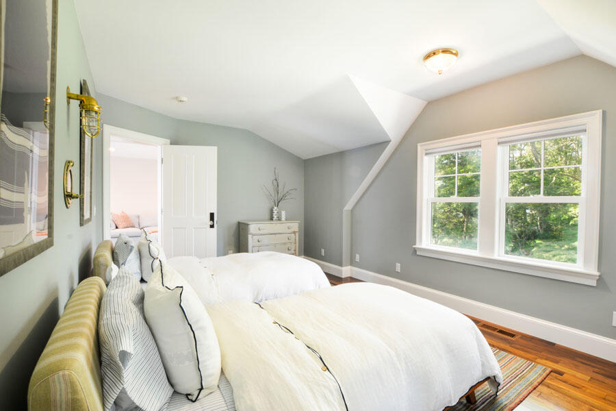 71 Sand Point Osterville, MA 02655 - Photo 37 of 45 a bedroom with a bed and a large window