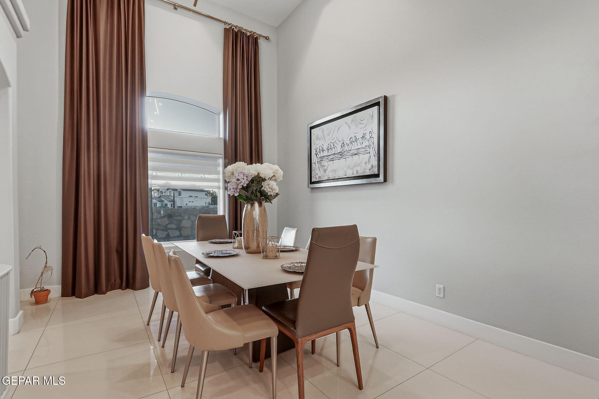 1297 Cypress Ridge Drive El Paso, TX 79912 - Photo 18 of 77 a view of a dining room with furniture and wooden floor