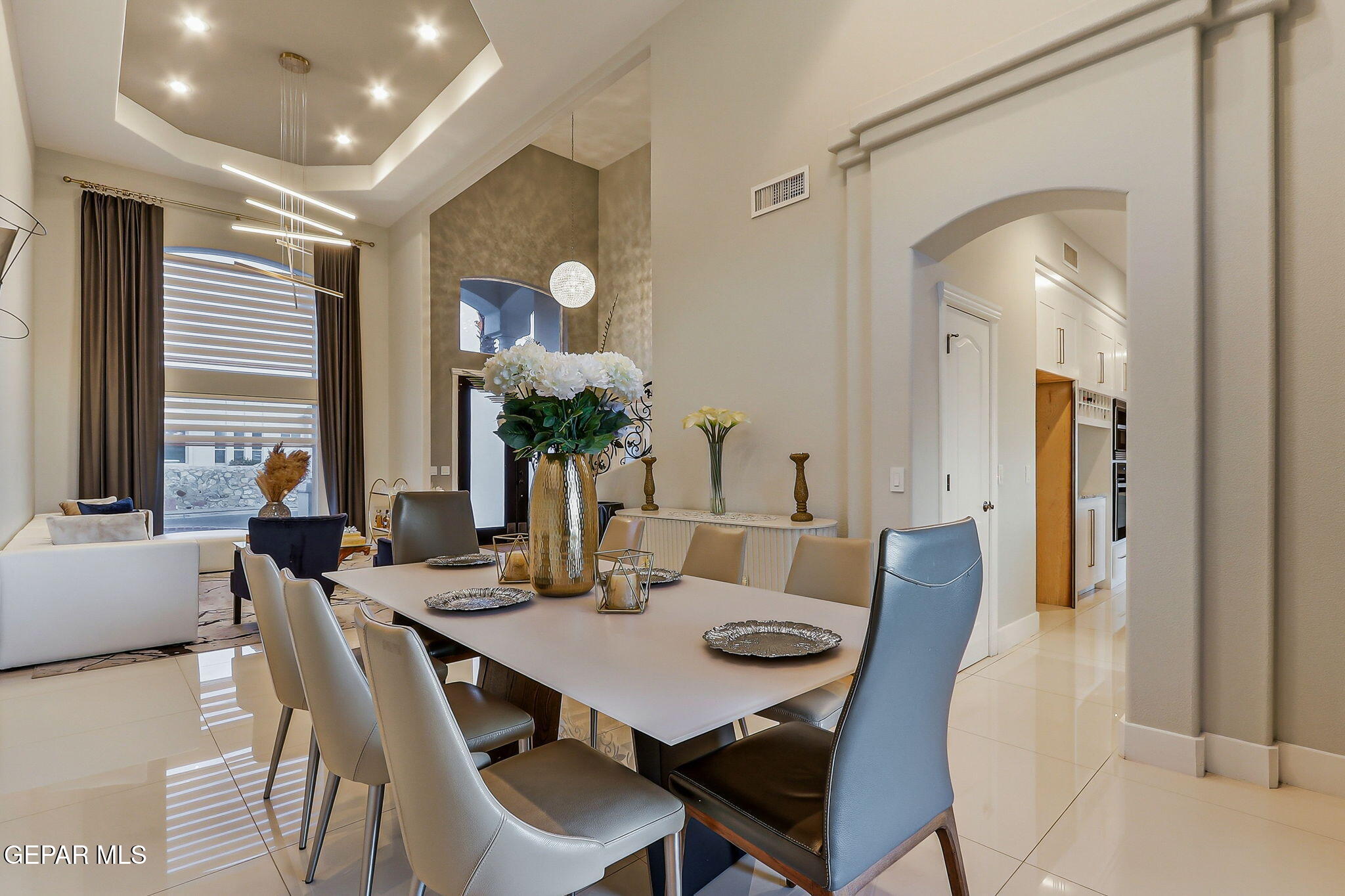 1297 Cypress Ridge Drive El Paso, TX 79912 - Photo 19 of 77 a view of a dining room with furniture and a potted plant