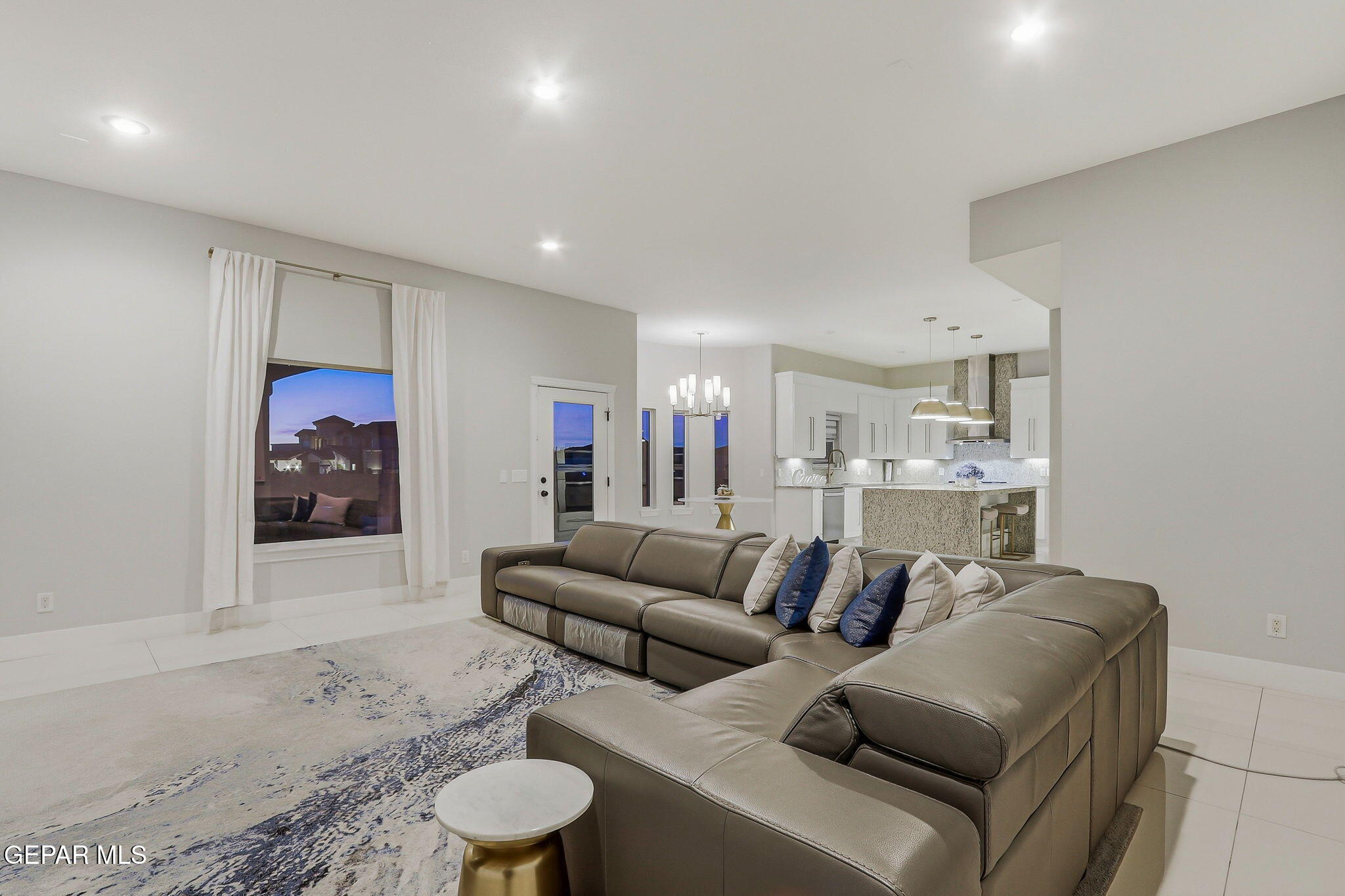 1297 Cypress Ridge Drive El Paso, TX 79912 - Photo 29 of 77 a living room with furniture and a view of kitchen