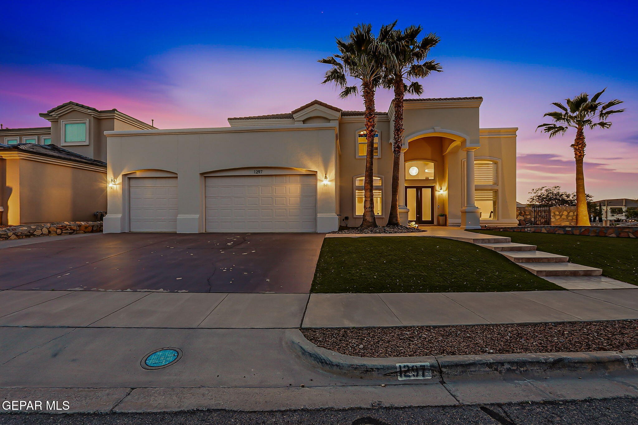 1297 Cypress Ridge Drive El Paso, TX 79912 - Photo 3 of 77 a front view of a house with garden