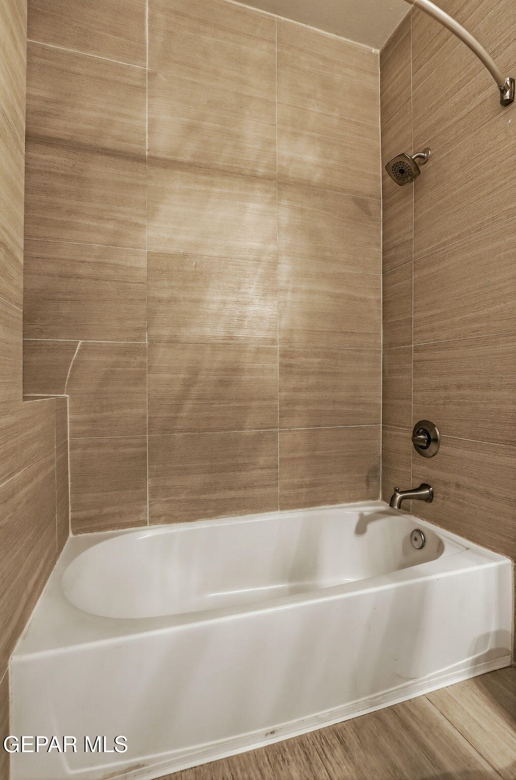 1297 Cypress Ridge Drive El Paso, TX 79912 - Photo 46 of 77 a bathroom with a bathtub and a shower