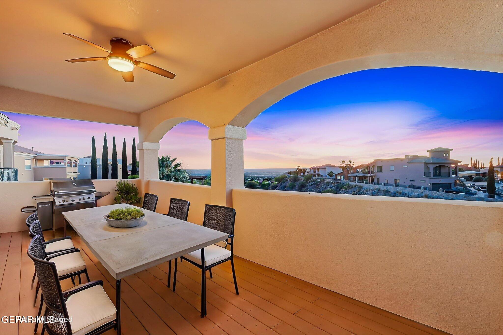 1297 Cypress Ridge Drive El Paso, TX 79912 - Photo 69 of 77 a view of a balcony with a table and chairs
