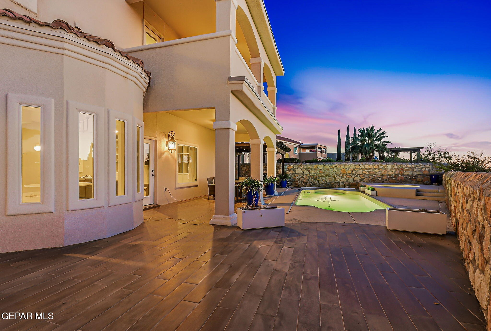 1297 Cypress Ridge Drive El Paso, TX 79912 - Photo 73 of 77 a view of a house with swimming pool in front of it