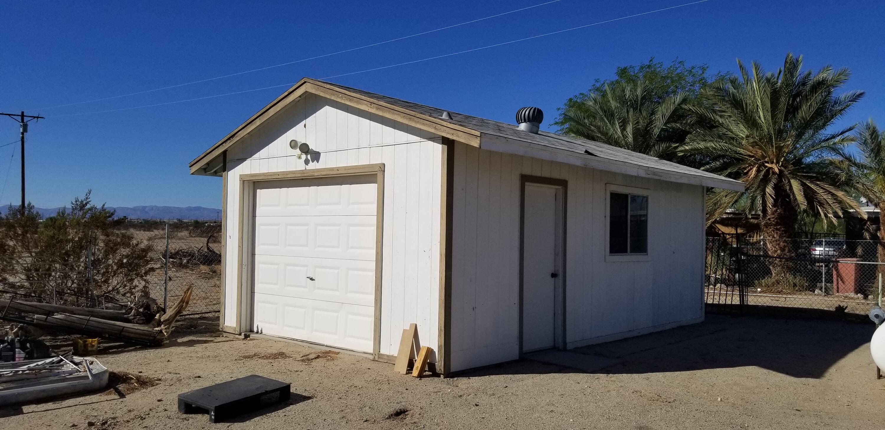 2331 Shore Isle Avenue Thermal, CA 92274 - Photo 2 of 14 a view of a house with a yard