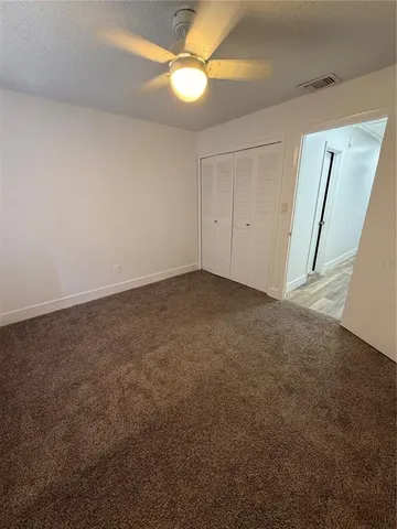 an empty room with a empty space and a window