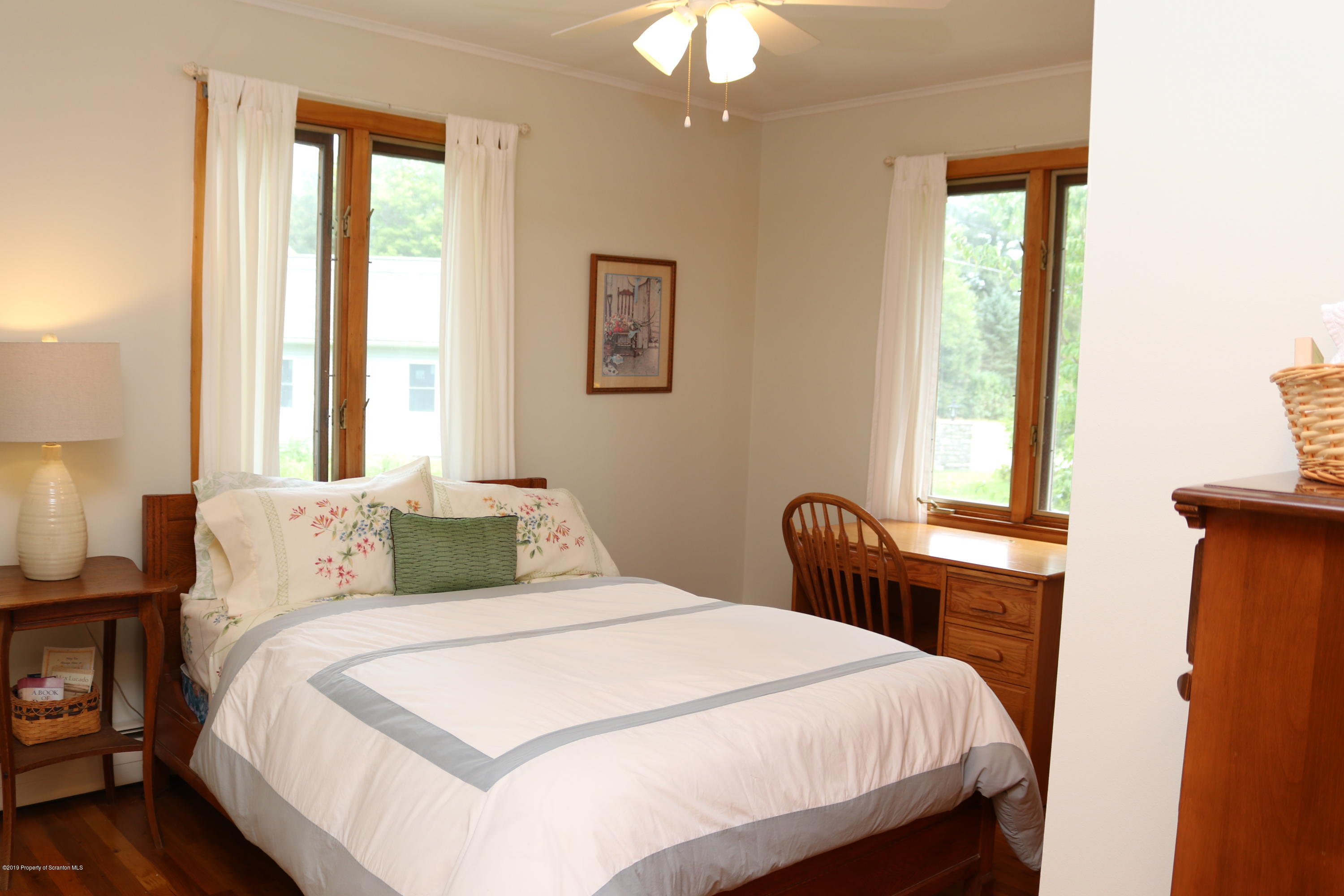 29 Parry Road Moscow, PA 18444 - Photo 15 of 38 a bedroom with a bed and a window
