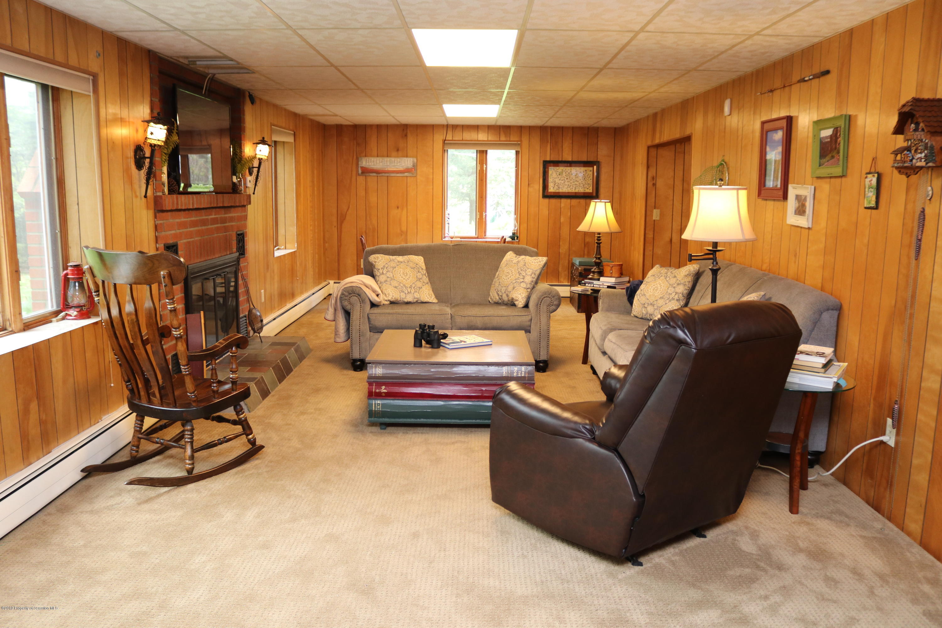 29 Parry Road Moscow, PA 18444 - Photo 20 of 38 a living room with furniture and a piano