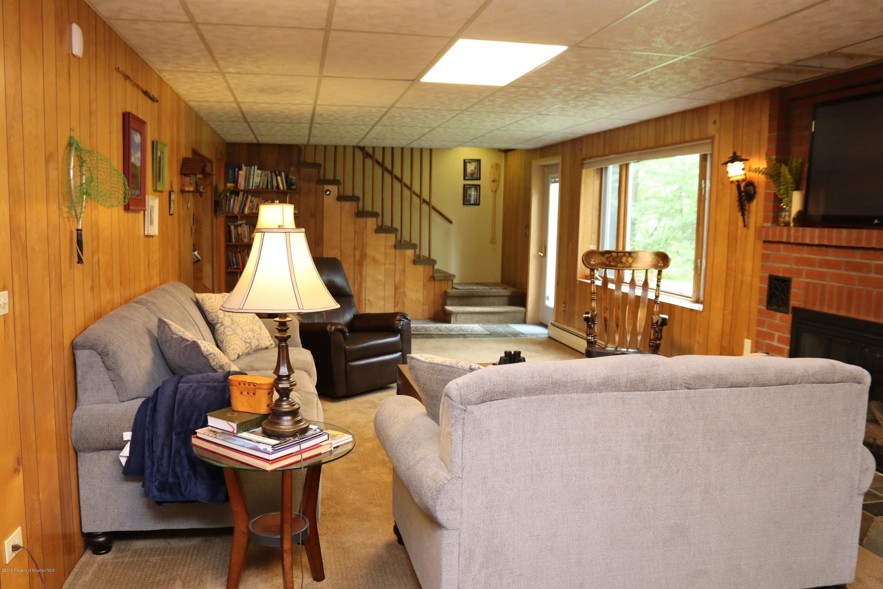 29 Parry Road Moscow, PA 18444 - Photo 23 of 38 a living room with furniture a window and a dining table