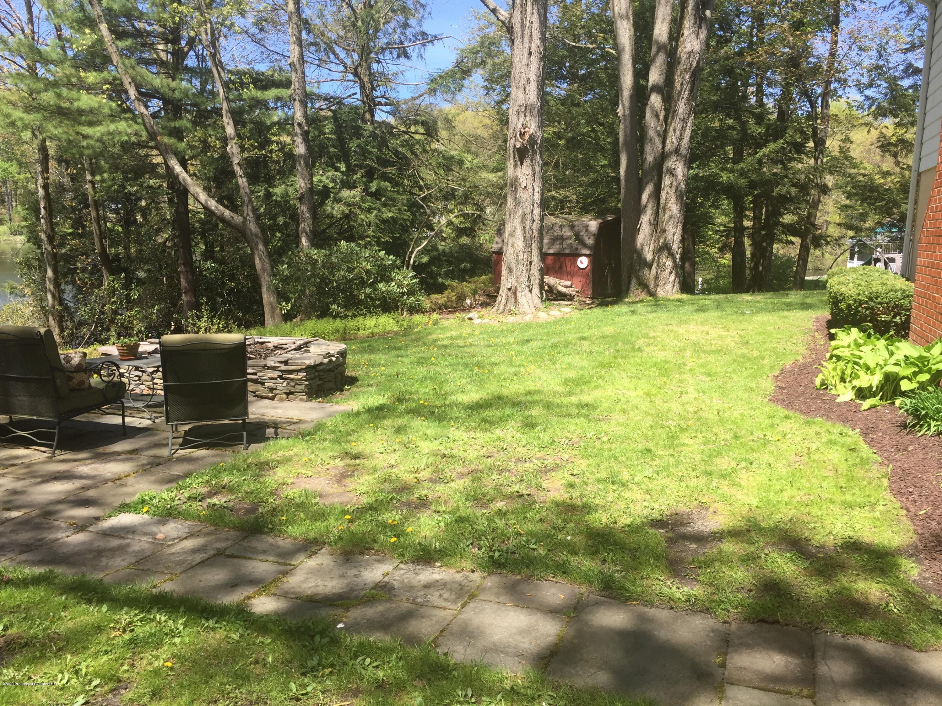 29 Parry Road Moscow, PA 18444 - Photo 38 of 38 a backyard of a house with lots of green space