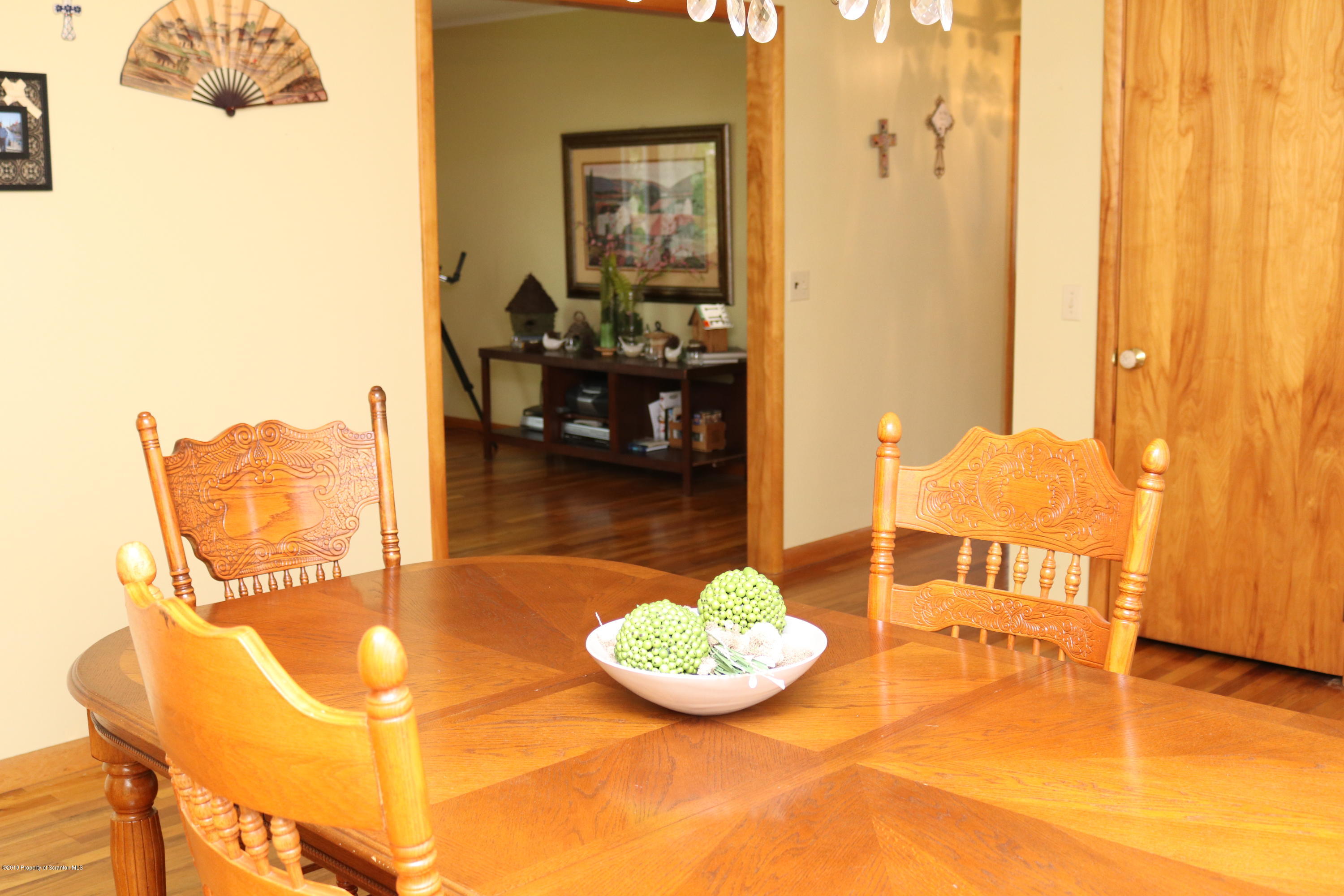 29 Parry Road Moscow, PA 18444 - Photo 6 of 38 a view of a dining room with furniture and a rug