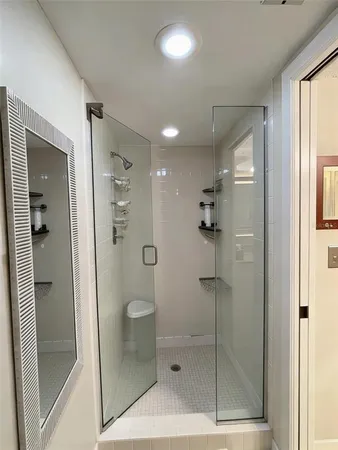 a kitchen with stainless steel appliances a stove a sink and cabinets