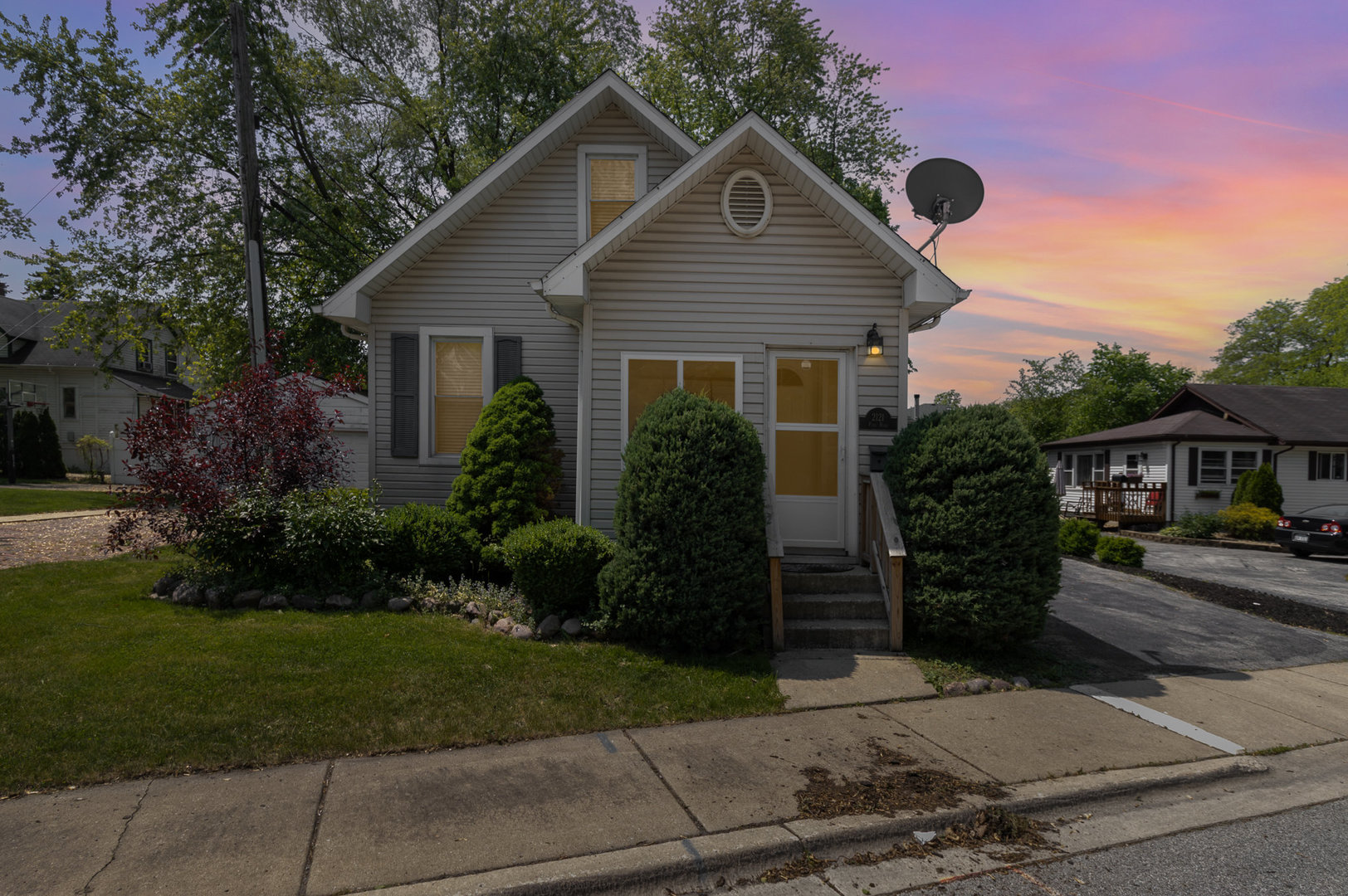 2121 Pine Road Homewood, IL 60430 - Photo 1 of 20 a front view of a house with garden