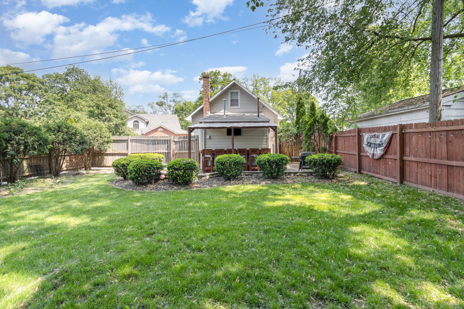 2121 Pine Road Homewood, IL 60430 - Photo 15 of 20 a front view of a house with garden