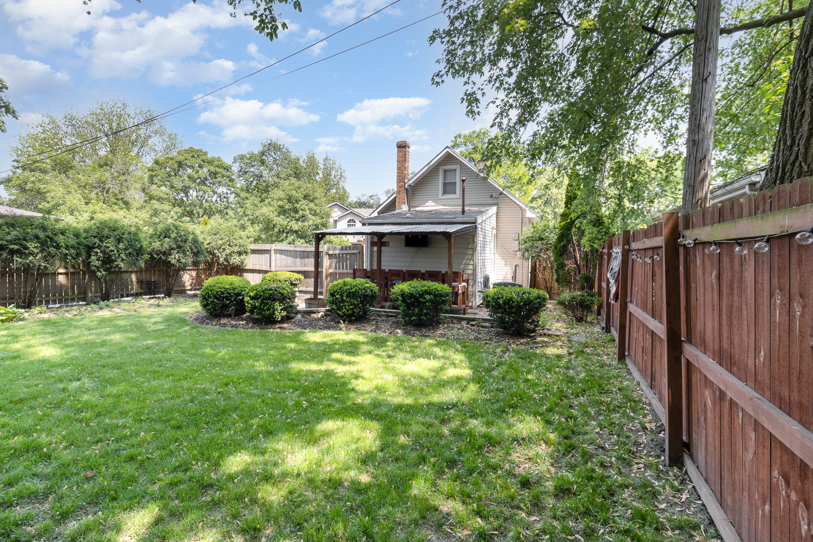 2121 Pine Road Homewood, IL 60430 - Photo 16 of 20 a front view of a house with garden